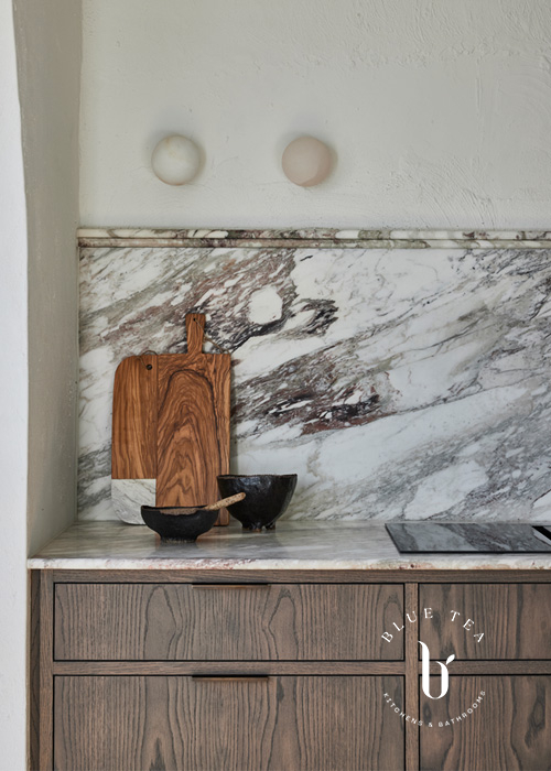 marble splashback with timber detailed drawers: Woollahra