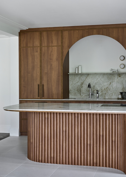 A ribbed and curved timber island is the showpiece in our Mosman project.